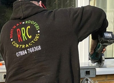 Rightway roofer at work on a property