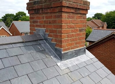New lead flashing around a brick chimney