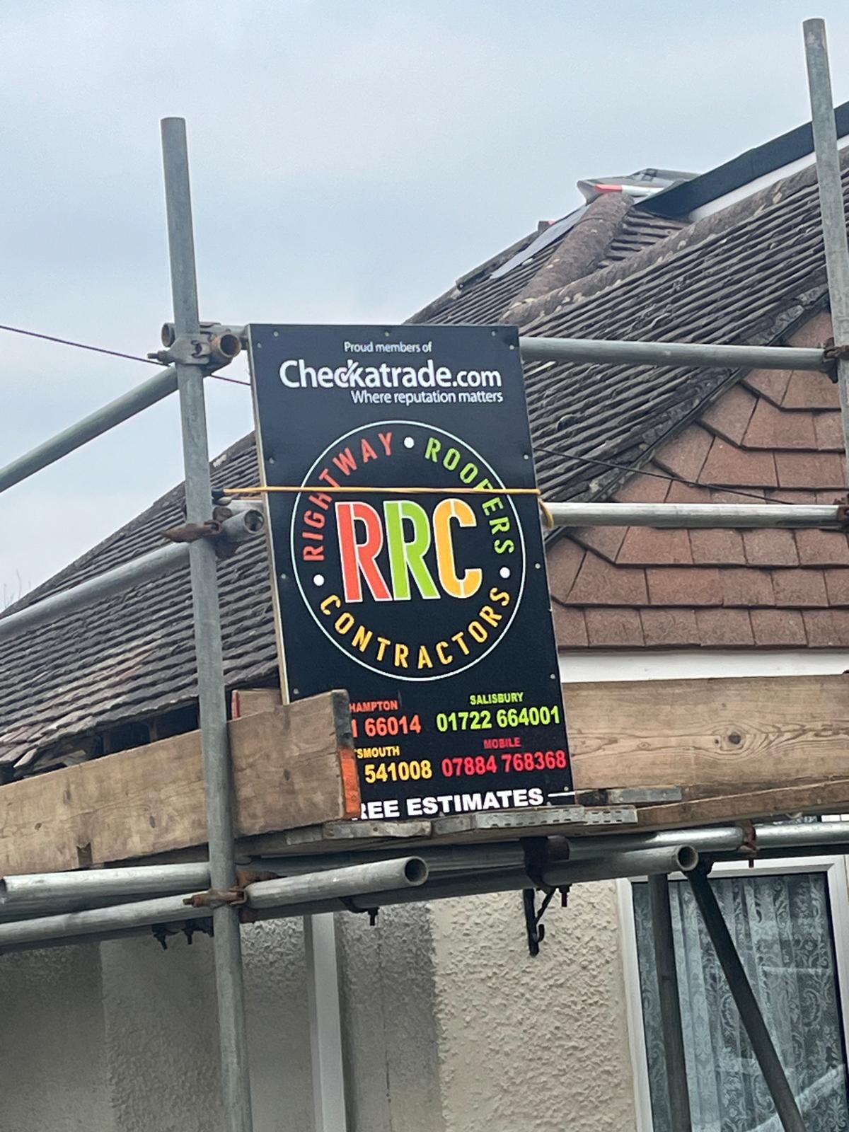 Rightway Roofers scaffold and sign on a Salisbury roof repair